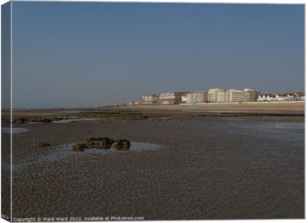 Bexhill from the beach at low tide. Canvas Print by Mark Ward