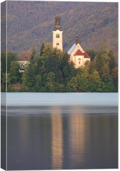 Sunrise over Lake Bled and the island church Canvas Print by Ian Middleton