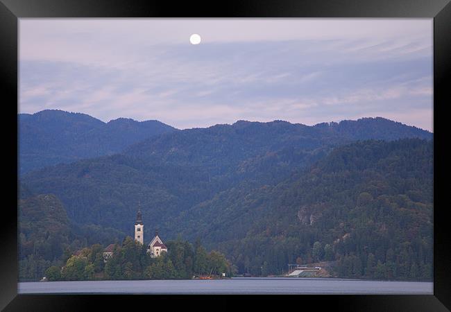 Moon setting at sunrise Lake Bled Framed Print by Ian Middleton