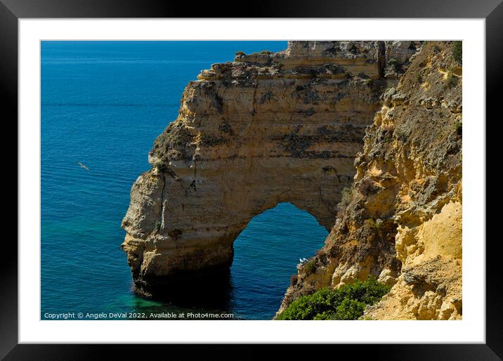 Cliffs Arch in Praia da Marinha Framed Mounted Print by Angelo DeVal