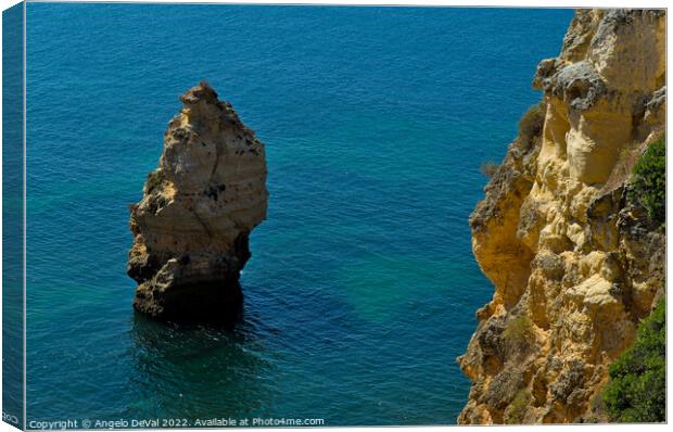 Cliffs and Ocean in Carvoeiro Canvas Print by Angelo DeVal