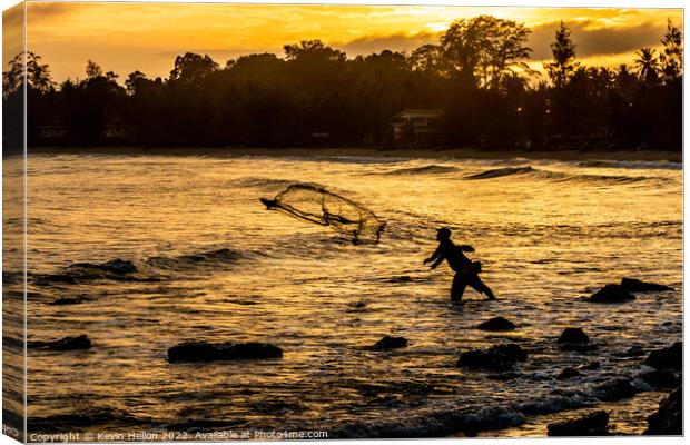 Fisherman at sunset Canvas Print by Kevin Hellon
