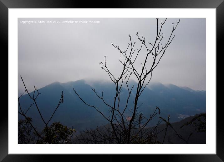 Morning fog in the mountains Framed Mounted Print by Stan Lihai