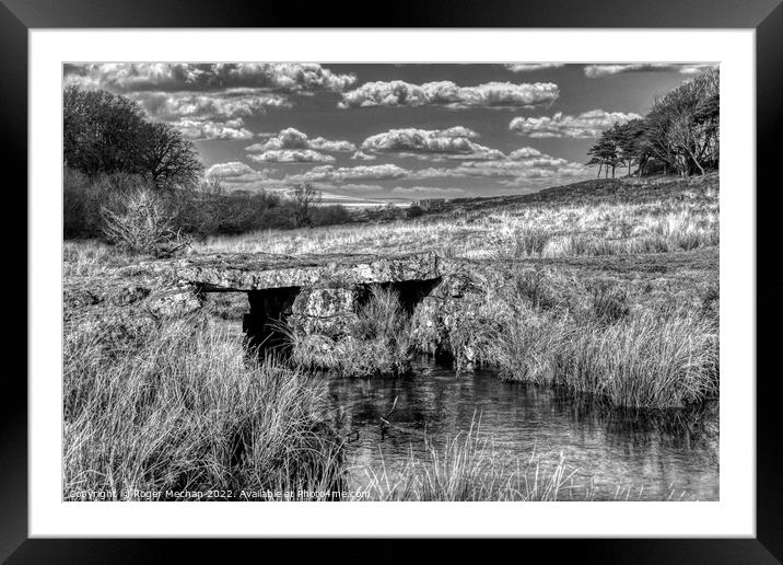 Granite bridge over Dartmoor stream Framed Mounted Print by Roger Mechan