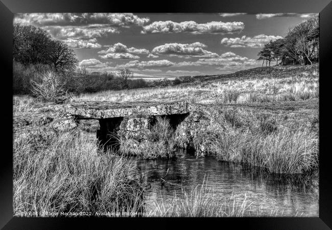 Granite bridge over Dartmoor stream Framed Print by Roger Mechan