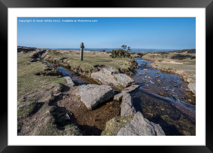 Isolation by a Dartmoor stream with stone cross  Framed Mounted Print by Kevin White