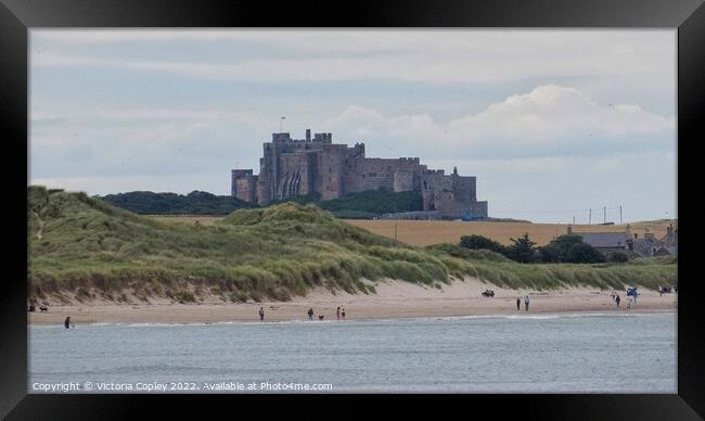 Bamburgh castle Framed Print by Victoria Copley