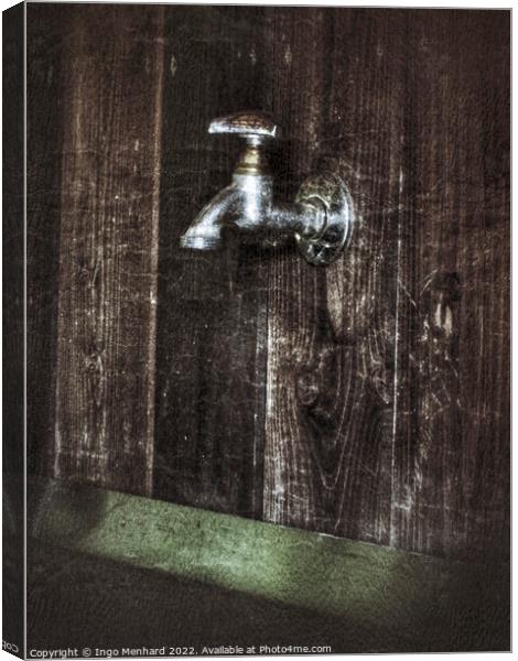 Old unused water faucet on a wooden wall Canvas Print by Ingo Menhard
