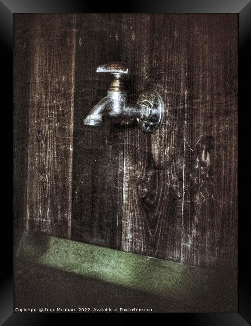 Old unused water faucet on a wooden wall Framed Print by Ingo Menhard