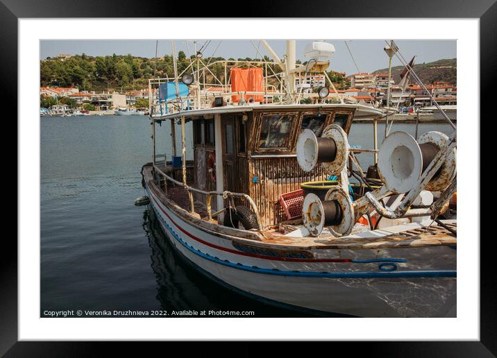 Old fish boat Framed Mounted Print by Veronika Druzhnieva