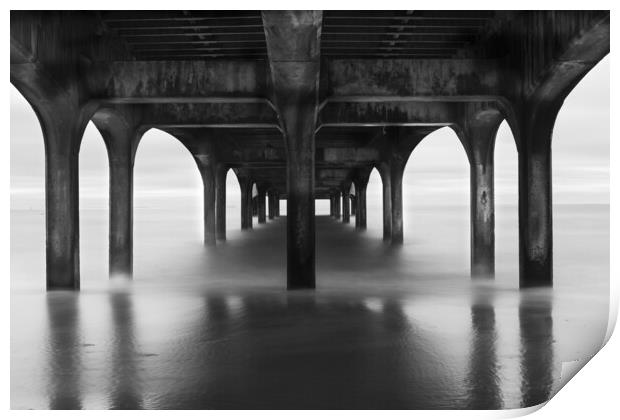 Under the pier at Boscombe Beach Print by Anthony Hart