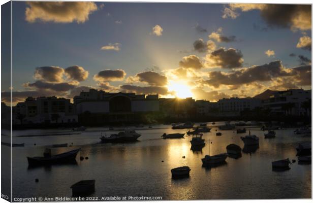 Sunset over Arrecife inner harbour Canvas Print by Ann Biddlecombe