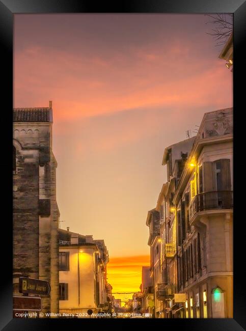 Sunset Apartments Balconies Narrow Street Nimes France Framed Print by William Perry