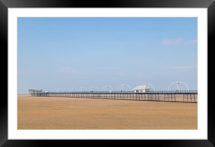 Southport Pier under a blue sky Framed Mounted Print by Jason Wells