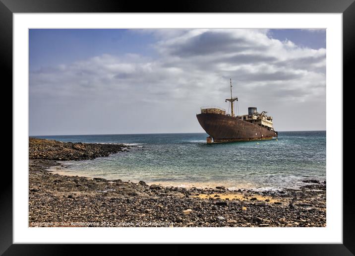 Shipwreck on the walk from Costa Teguise to Arrecife Framed Mounted Print by Ann Biddlecombe