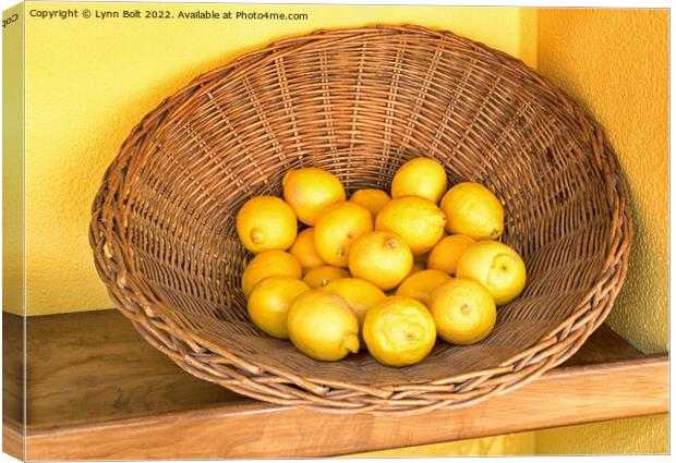 Basket of Lemons Canvas Print by Lynn Bolt