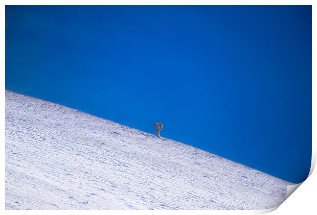 Photographer on a Snowy Mountain Print by Duncan Loraine