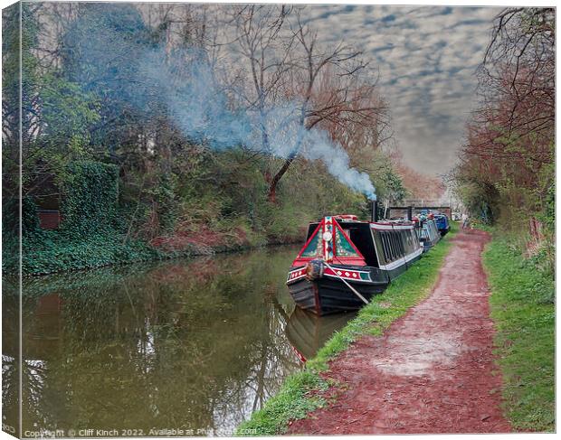 Narrowboats on the canal Canvas Print by Cliff Kinch