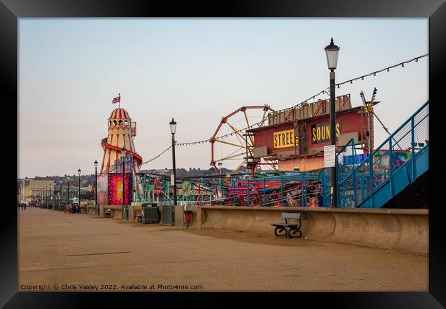 Funfair on the prom Framed Print by Chris Yaxley