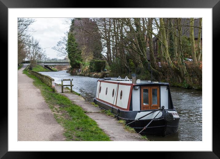 Small narrow boat on the canal Framed Mounted Print by Jason Wells