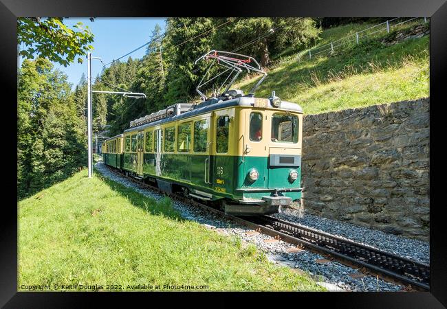 Swiss train at Lauterbrunnen Framed Print by Keith Douglas