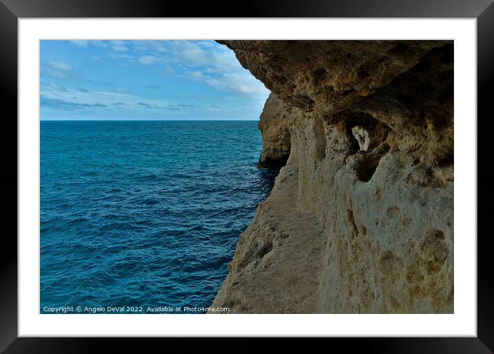 Exploring the Cliffs in Carvalho Beach. Algarve Framed Mounted Print by Angelo DeVal