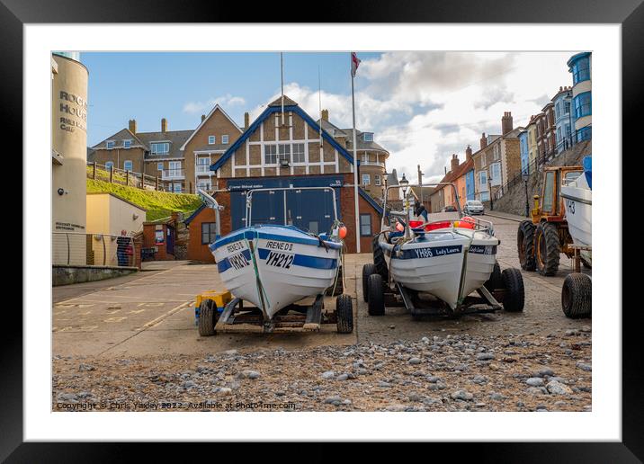 Fishing in the seaside town of Cromer on the North Norfolk coast Framed Mounted Print by Chris Yaxley