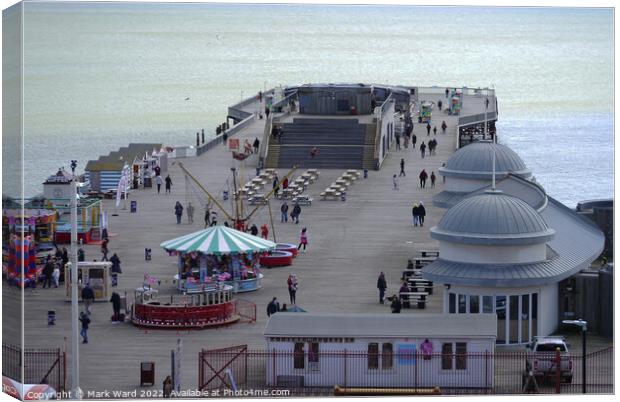 Hastings Pier on a cold April day. Canvas Print by Mark Ward