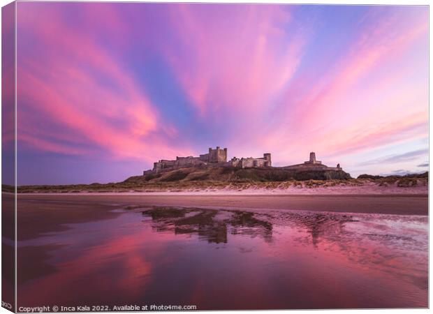 Evening Clouds over Bamburgh Castle Canvas Print by Inca Kala