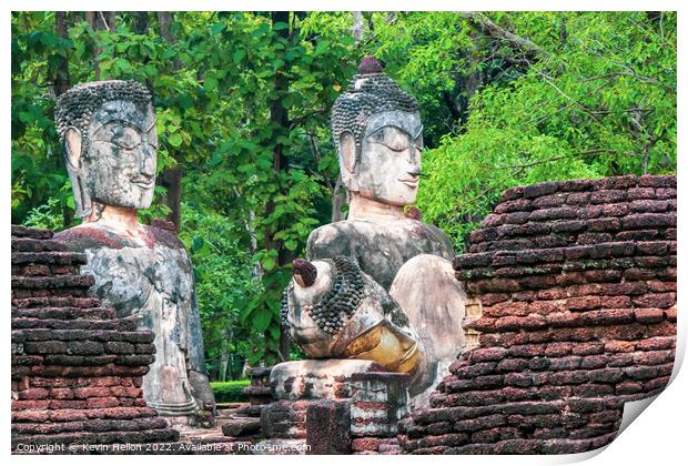 Buddha statues in Khamphaeng Phet Historical Park, Thailand Print by Kevin Hellon