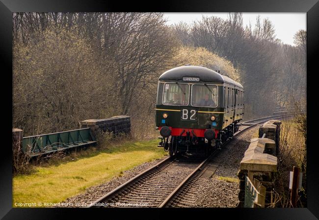 Heritage Diesel approaching Burrs Country Park Framed Print by Richard Perks