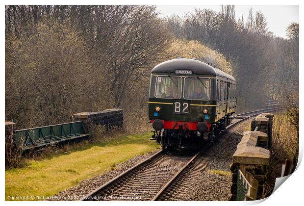 Heritage Diesel approaching Burrs Country Park Print by Richard Perks