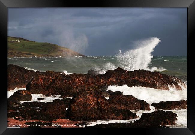 Sea spray and waves on the Antrim coast. Framed Print by Paul Clifton