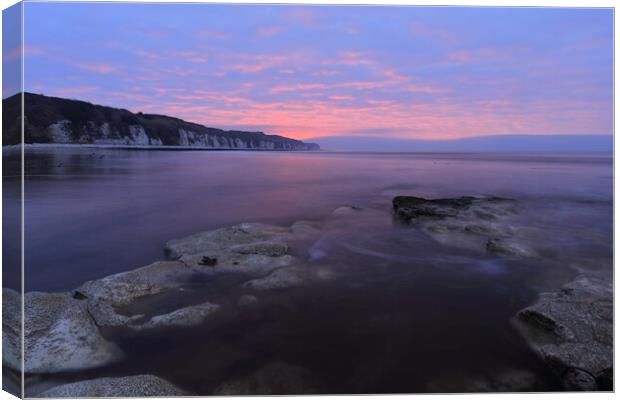The beach at Danes Dyke at sunrise. Canvas Print by Drew Watson