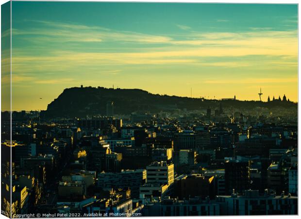 Barcelona evening cityscape at sunset with Montjuic in silhouette, Catalonia, Spain Canvas Print by Mehul Patel
