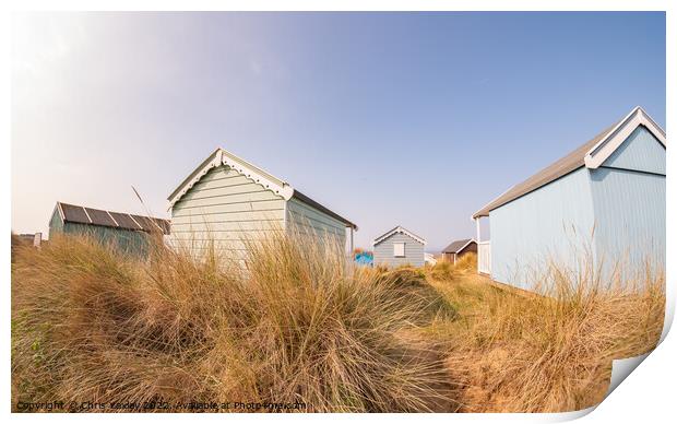 Norfolk beach huts Print by Chris Yaxley