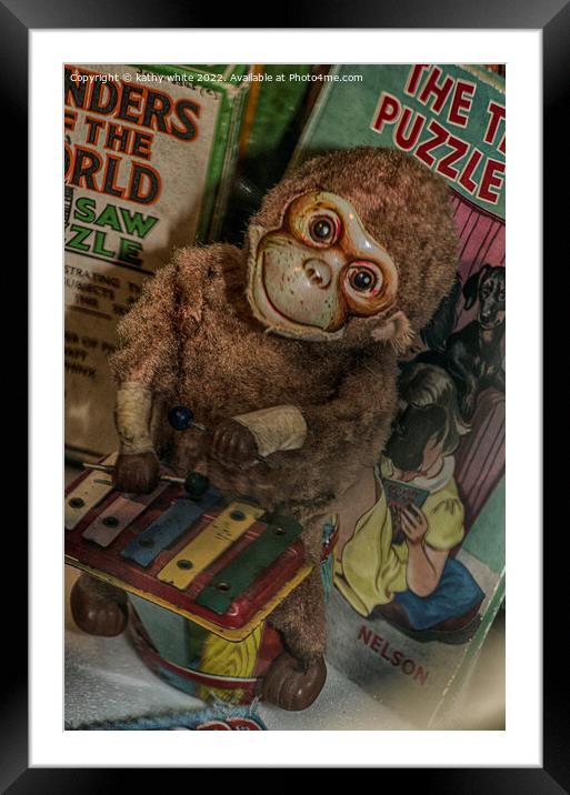 Old toy monkey Framed Mounted Print by kathy white