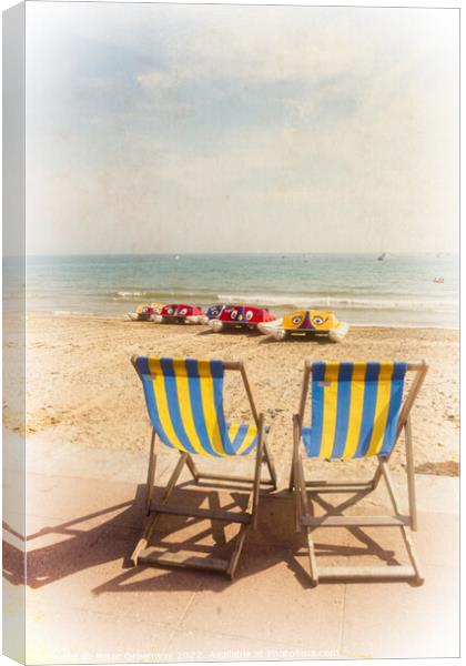 English Seaside Striped Deckchairs Overlooking The Canvas Print by Peter Greenway