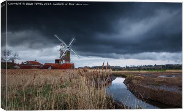 Moody Skies Over Cley Mill Canvas Print by David Powley