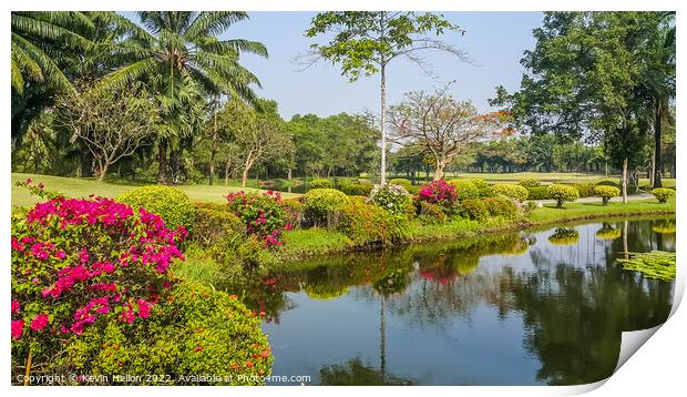Lake and flowers, Dynasty golf course, Nakhon Pathom, Thailand Print by Kevin Hellon