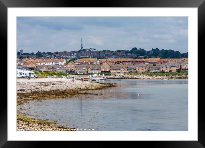 Chisel Beach Dorset reflection of the town in the water  Framed Mounted Print by Holly Burgess