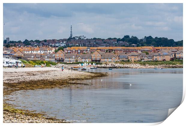 Chisel Beach Dorset reflection of the town in the water  Print by Holly Burgess