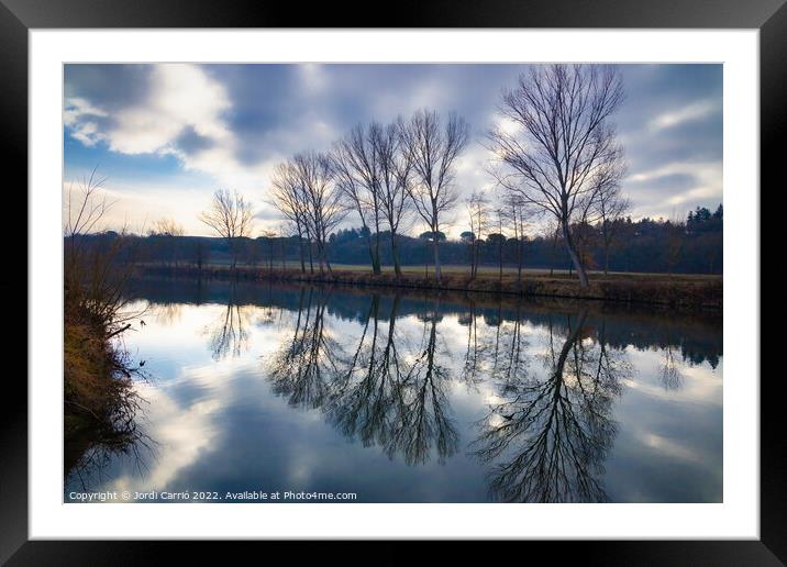 Reflections in the river on a cloudy day. - Orton glow Edition  Framed Mounted Print by Jordi Carrio