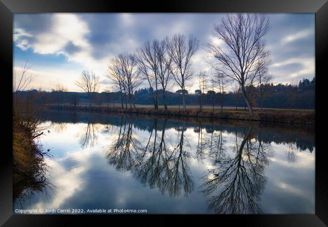 Reflections in the river on a cloudy day. - Orton glow Edition  Framed Print by Jordi Carrio