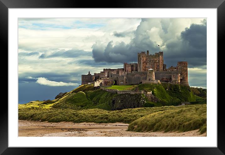 Cloudy Bamburgh Castle Framed Mounted Print by Kevin Tate