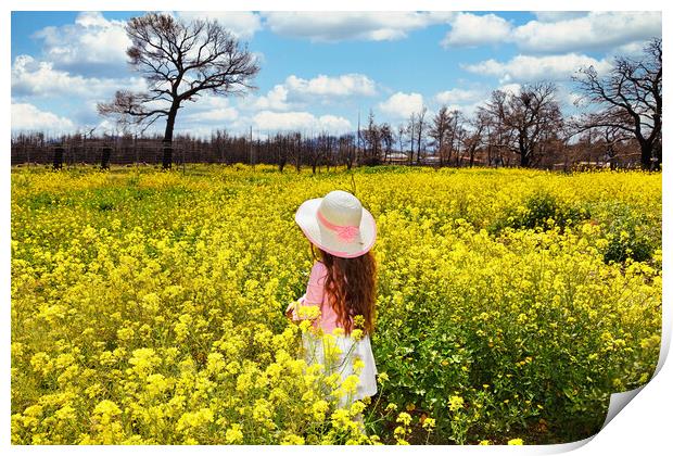 A small girl in a field of spring wildflowers Print by Constantinos Iliopoulos