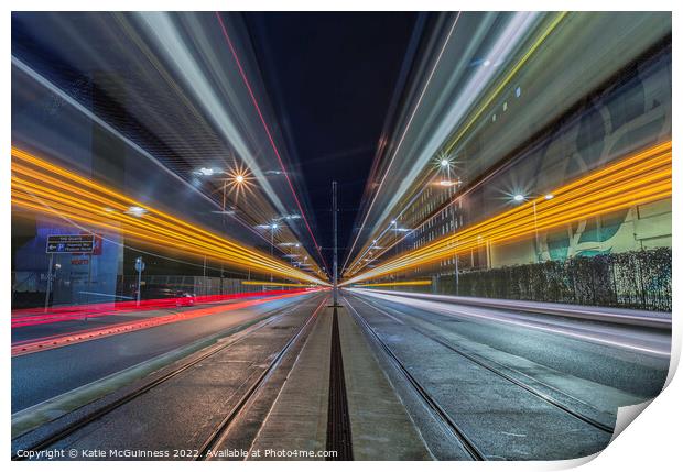 Passing light trails from 2 trams in Manchester Print by Katie McGuinness
