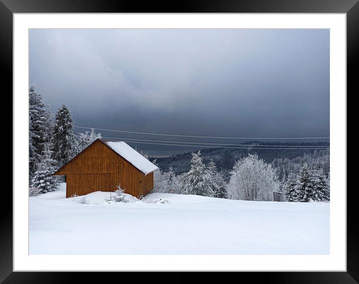 Winter calm mountain landscape with red shed or barn and mount ridge behind polish mountain named turbacz in Poland Framed Mounted Print by Arpan Bhatia