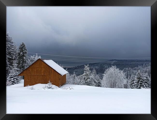 Winter calm mountain landscape with red shed or barn and mount ridge behind polish mountain named turbacz in Poland Framed Print by Arpan Bhatia