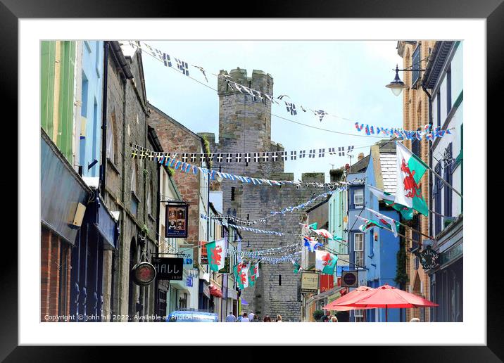 Flags and bunting, Caernarfon, North Wales, UK. Framed Mounted Print by john hill